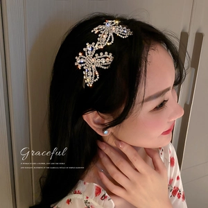 Elegant fashion headband featuring sparkling rhinestone butterfly design for women