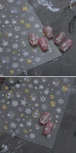 Detailed macro view of 3D embossed butterfly nail stickers with gold metallic texture