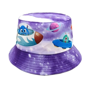 Close-up of purple bucket hat with cartoon spaceship, planet patterns and fine stitching