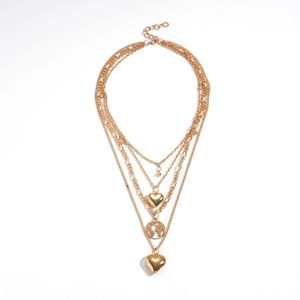 Multilayer gold necklace with geometric heart pendants and world map charm design