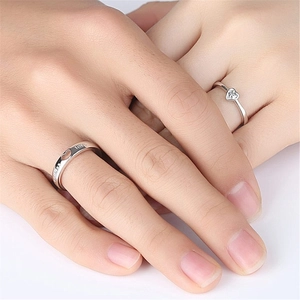 Silver couples ring set with hollow heart design and love engraving on hands