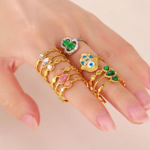 Set of 5 vintage gold stainless steel rings with colorful gemstones and Hamsa hand detail