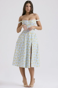Detail of light blue floral dress showing off-shoulder neckline and waist pleats