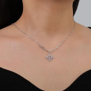 Stainless steel witch knot necklace featuring double-layer pendant and paperclip chain