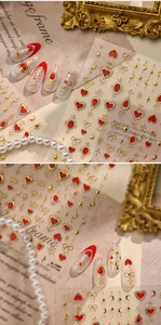 Macro view of M1361 vintage 3D nail stickers featuring red hearts and gold bows