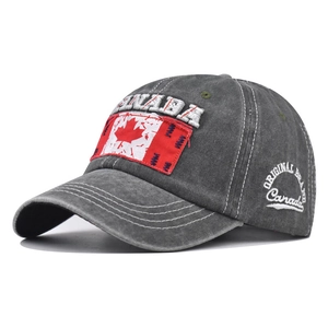 Close-up of the vintage washed cotton texture and CANADA embroidery on the baseball cap
