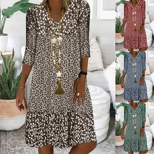 Women's V-neck floral midi dress with 3/4 sleeves available in brown, red, and blue