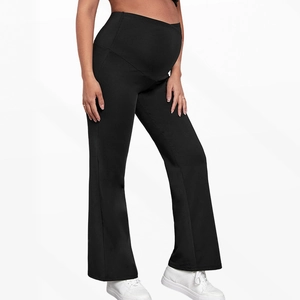 Detailed side view of maternity high waist flare pants with elastic belly support panel