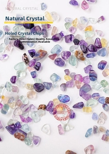 Macro detail of natural fluorite crystal chips with pre-drilled holes for DIY jewelry