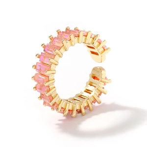Hip hop style gold ring with pink rectangular gemstones on a clean white background