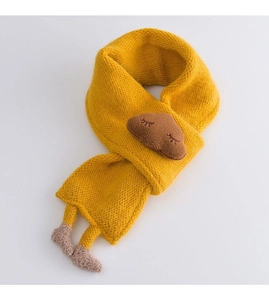 Detail of yellow knitted baby scarf featuring cute cloud and footprint decorations