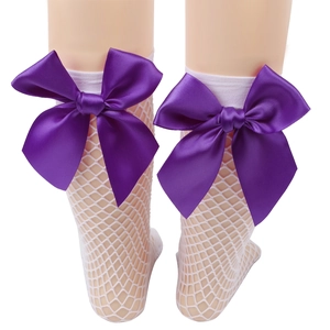White fishnet ankle socks for girls featuring large purple satin bows in British style