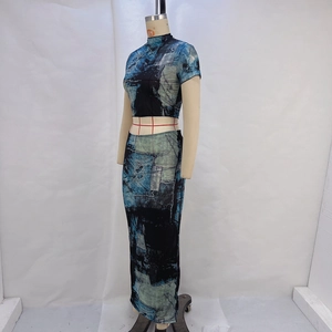 Detail of slim-fit two-piece set featuring abstract blue and black artistic prints