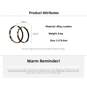 Detail view of large leopard print hoop earrings with 5.2cm diameter and silver pin