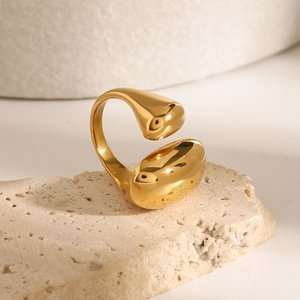 Polished gold stainless steel open ring with water drop design on natural stone base
