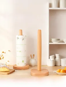 Detailed view of natural beech wood kitchen roll holder with stable weighted base