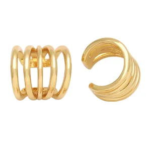 Gold multi-layer spiral ear cuff with five-ring geometric design shown on white background