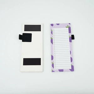 Magnetic daily planner notepad with purple berry pattern and integrated pen holder loop