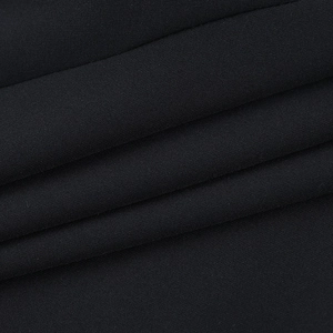 Close-up of black high-density knit fabric showing smooth texture and soft drape