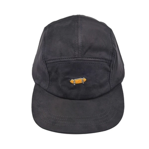 Classic black cotton camper hat with yellow skateboard embroidery and curved brim visor