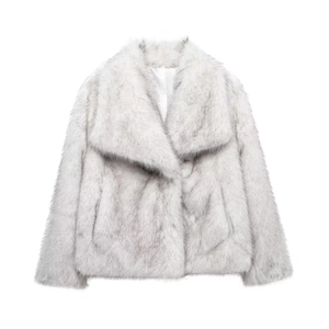 Detailed view of grey faux fur coat featuring soft texture and wide notched lapels