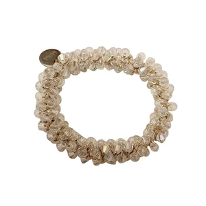 Faceted crystal bead hair tie with LUNA metal charm on a clean white background