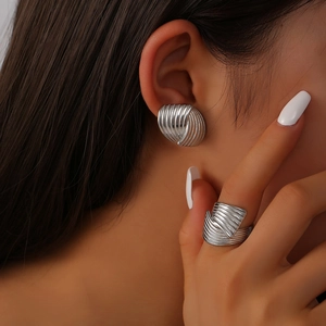 Polished silver-tone 18K gold plated titanium jewelry set with textured earring and ring