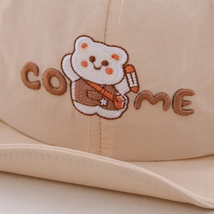 Beige baby sun hat featuring cute embroidered bear and breathable quick-dry fabric