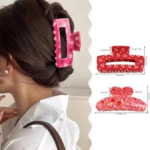 Pink heart print acrylic hair claw set with rectangular and heart-shaped hair clips