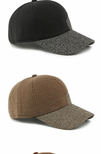 Detailstruktur der dicken Winter-Baseballkappen aus schwarzem und braunem Wollgemisch