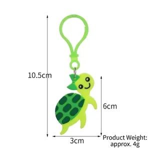 Cartoon turtle keychain with green bow and plastic hook for ocean themed party favors