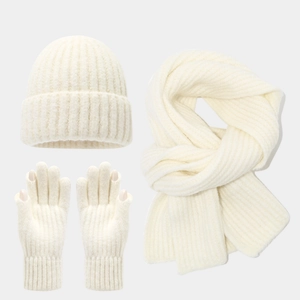 Detail of cream white ribbed knit winter set with beanie hat scarf and gloves