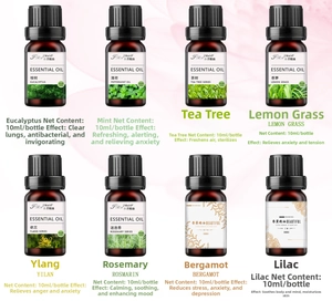 Macro view of 8-bottle aromatherapy essential oil set in amber glass vials