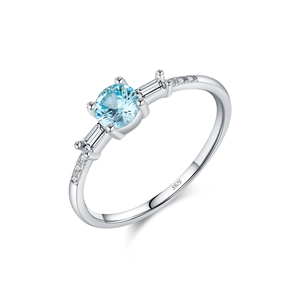 Elegant S925 sterling silver ring with round light blue crystal and baguette side stones