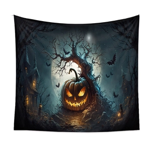 Detail of Halloween tapestry showing glowing pumpkin and haunted castle on polyester