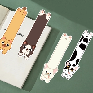 Detail of creative cartoon dog bookmarks showing cute Shiba Inu and Bulldog designs on book pages