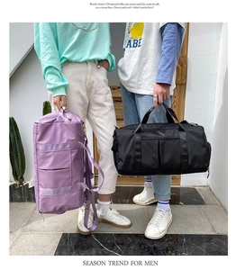 Close-up of purple and black large capacity travel bags featuring wet and dry separation