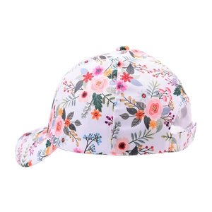 Detail of floral baseball cap showing high-quality stitching and adjustable back strap buckle