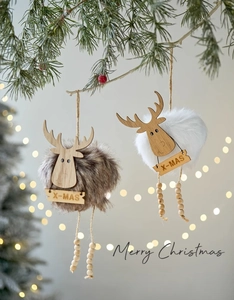Detail of Christmas reindeer ornaments with faux fur and X-MAS wooden tags on twine