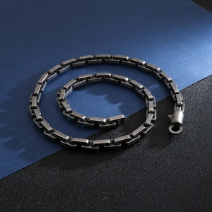 Detail of silver-tone stainless steel venice box chain with secure lobster clasp