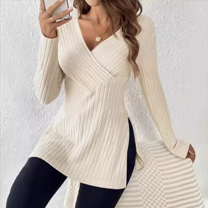 Slim fit cream V-neck ribbed knit top with long sleeves and side slit detail for women