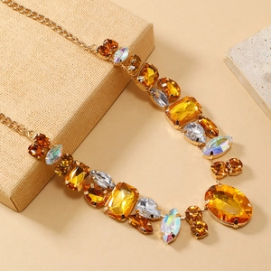 Statement necklace with multicolored amber gemstones on a chunky gold chain for banquet wear