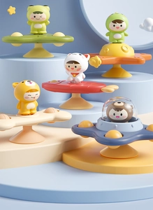 Detailed view of five colorful 3D cartoon animal suction cup spinners for baby high chairs