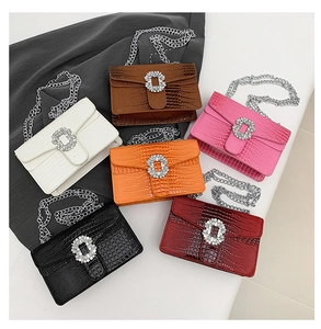 Detailed collection of crocodile pattern bags in multiple colors with rhinestone buckles