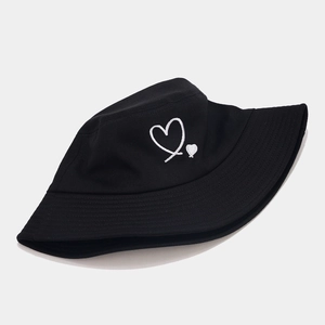 Classic black cotton bucket hat featuring minimalist white heart embroidery for daily sun protection