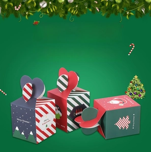 Macro detail of various Christmas gift boxes featuring unique heart-shaped top closures