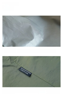 Detail of waterproof silver lining and reinforced stitching on olive lunch bag