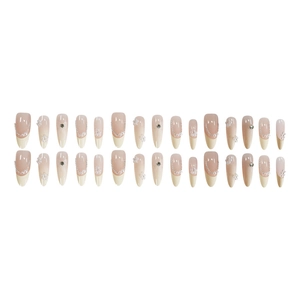 Almond-shaped press-on nails with French white tips and 3D pearl floral accents
