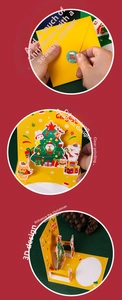 Detailed 3D pop-up Christmas card featuring Santa and reindeer with envelope and sticker