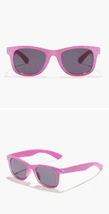 Detail view of pink glitter square frames with dark lenses for children fashion